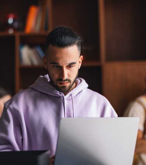 Student taking notes